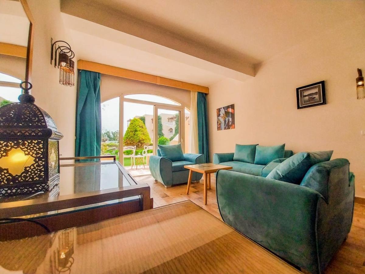 Prima Life Makadi Hotel Hurghada Exterior photo A living room in a villa